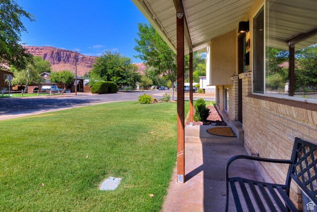 414 W Park Dr W Unit 14, Moab, UT 84532 - view of yard with a mountain view