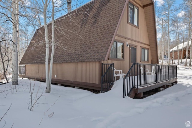11523 E Cliffrose Dr E Unit 1692, Heber City, UT 84032 - snow covered house with roof with shingles