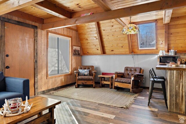 11523 E Cliffrose Dr E Unit 1692, Heber City, UT 84032 - living area featuring wood walls, beamed ceiling, and wood finished floors