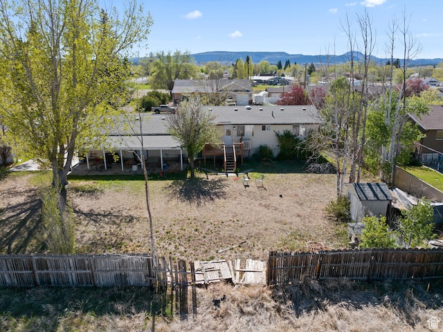 exterior space featuring a mountain view and a residential view