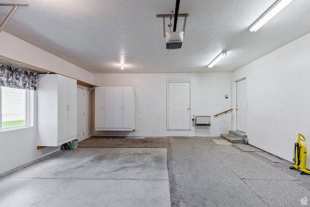 612 E 1280 N, Logan, UT 84341 - garage featuring a garage door opener