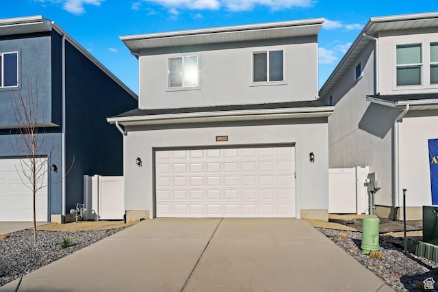 10033 N Torreya Dr Unit 737, Highland, UT 84003 - traditional home featuring stucco siding, an attached garage, and concrete driveway