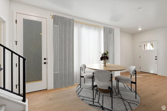 10033 N Torreya Dr Unit 737, Highland, UT 84003 - dining space featuring wood finished floors and stairway