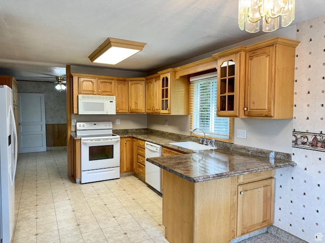 186 S 100 E St E, Laketown, UT 84038 - kitchen with glass insert cabinets, white appliances, a sink, and wallpapered walls