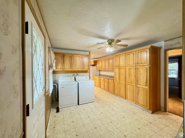 186 S 100 E St E, Laketown, UT 84038 - laundry room featuring a textured ceiling, separate washer and dryer, a ceiling fan, cabinet space, and light floors