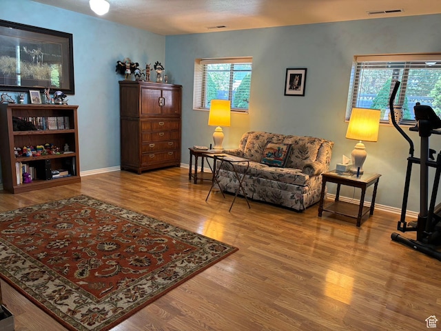 3383 W 6880 S, West Jordan, UT 84084 - sitting room featuring baseboards, wood finished floors, and visible vents