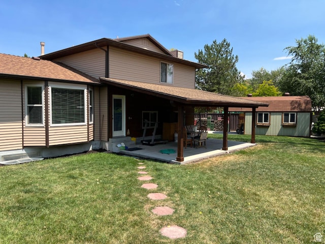 3383 W 6880 S, West Jordan, UT 84084 - rear view of property with a lawn, a chimney, entry steps, and a patio area