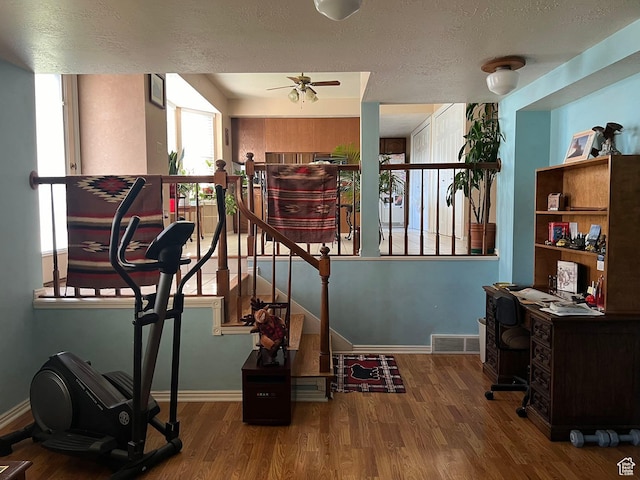 3383 W 6880 S, West Jordan, UT 84084 - interior space featuring wood finished floors, a textured ceiling, baseboards, and ceiling fan
