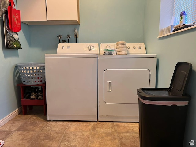 3383 W 6880 S, West Jordan, UT 84084 - washroom featuring cabinet space, baseboards, and washer and clothes dryer