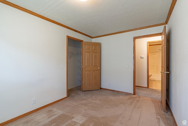 80 E 300 N Unit 3, Preston, ID 83263 - unfurnished bedroom with crown molding, light carpet, a closet, and baseboards