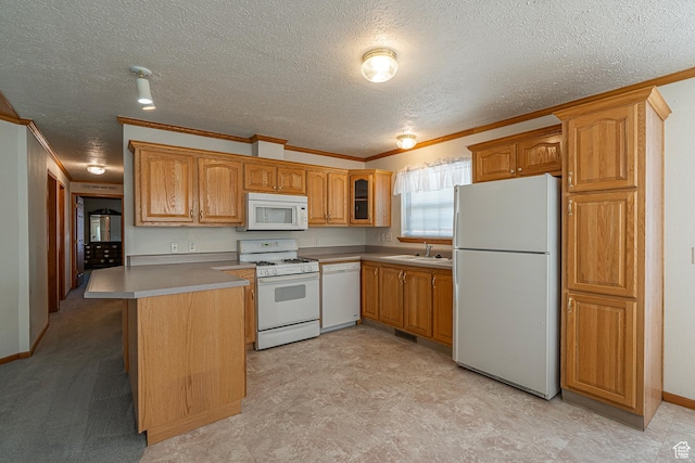 80 E 300 N Unit 3, Preston, ID 83263 - kitchen featuring a sink, white appliances, ornamental molding, a textured ceiling, and glass insert cabinets