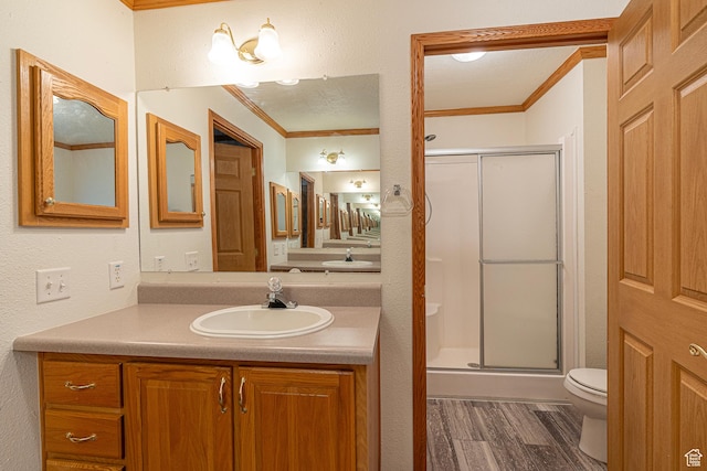 80 E 300 N Unit 3, Preston, ID 83263 - full bath featuring toilet, wood finished floors, vanity, a stall shower, and crown molding