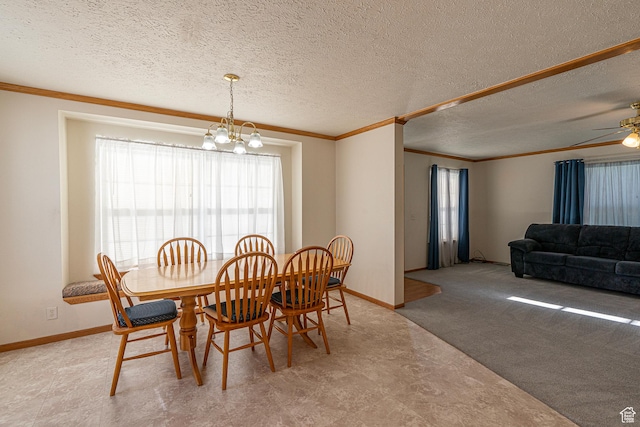 80 E 300 N Unit 3, Preston, ID 83263 - dining space featuring ornamental molding, a textured ceiling, baseboards, and ceiling fan with notable chandelier