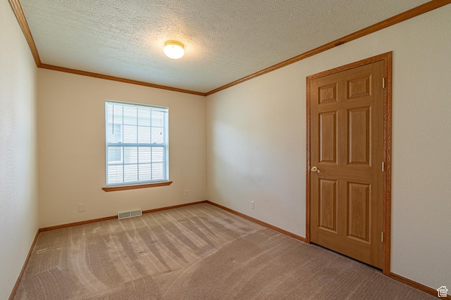 80 E 300 N Unit 3, Preston, ID 83263 - empty room with a textured ceiling, visible vents, baseboards, light carpet, and ornamental molding
