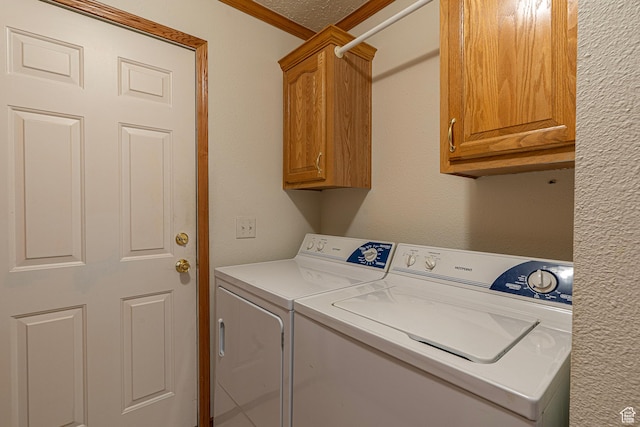 80 E 300 N Unit 3, Preston, ID 83263 - laundry area with washing machine and clothes dryer, ornamental molding, and cabinet space