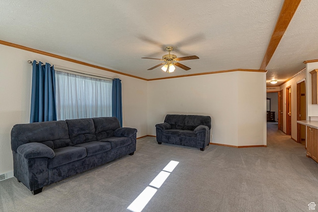 80 E 300 N Unit 3, Preston, ID 83263 - living room featuring a ceiling fan, crown molding, and light colored carpet