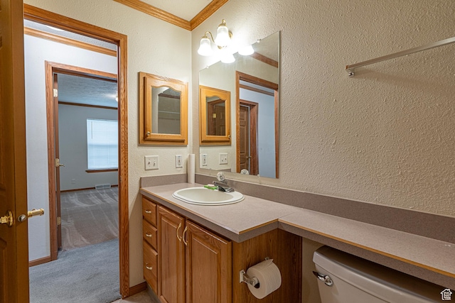 80 E 300 N Unit 3, Preston, ID 83263 - bathroom featuring crown molding, vanity, and a textured wall