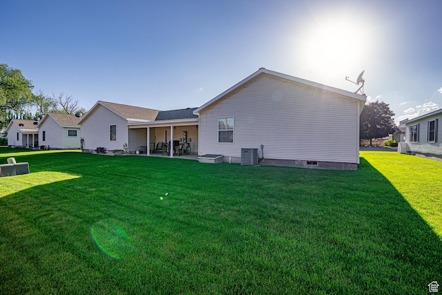 80 E 300 N Unit 3, Preston, ID 83263 - back of property featuring a lawn, central AC unit, a patio, and crawl space