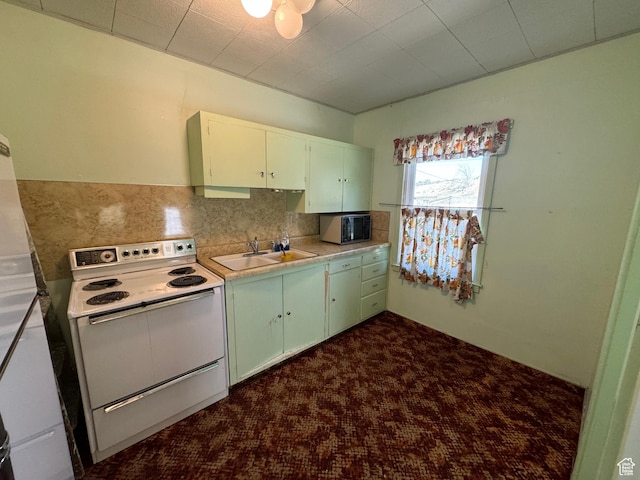 531 Edgehill Dr, Sunnyside, UT 84539 - kitchen featuring backsplash, a sink, light countertops, and white electric range