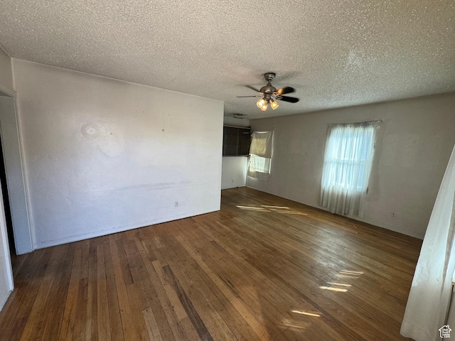 531 Edgehill Dr, Sunnyside, UT 84539 - empty room with hardwood / wood-style flooring, a textured ceiling, and ceiling fan