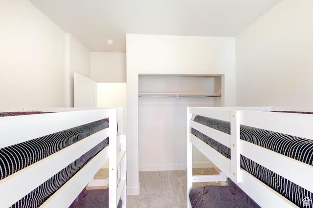 2216 S Beachcomber Ln, Garden City, UT 84028 - bedroom featuring a closet and carpet floors