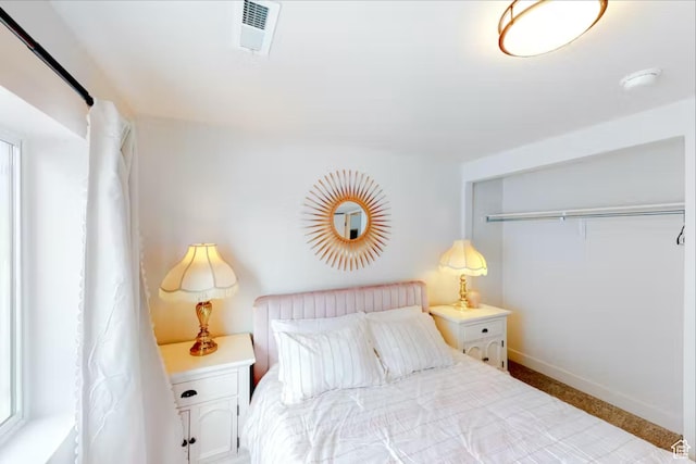 2216 S Beachcomber Ln, Garden City, UT 84028 - carpeted bedroom featuring visible vents and baseboards