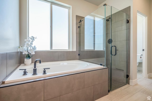 581 W Cypress Umber Dr Unit 34, St George, UT 84790 - full bath with a shower stall, plenty of natural light, a bath, and toilet