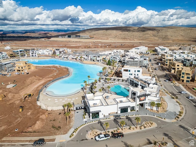 581 W Cypress Umber Dr Unit 34, St George, UT 84790 - drone / aerial view of a pool and mountains