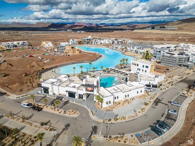 581 W Cypress Umber Dr Unit 34, St George, UT 84790 - aerial overview of property's location featuring a pool and a water and mountain view