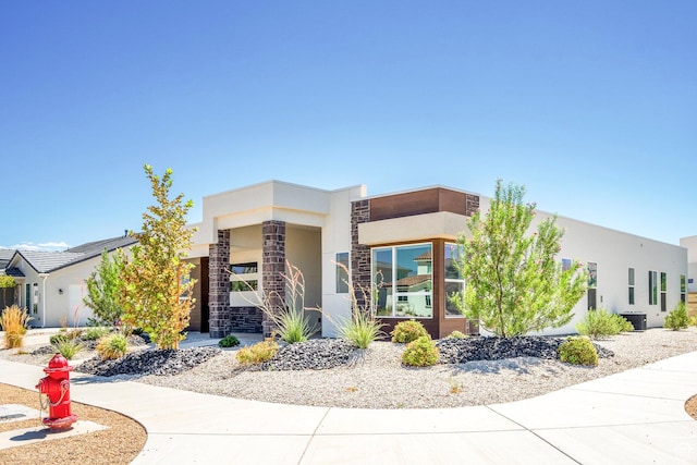 581 W Cypress Umber Dr Unit 34, St George, UT 84790 - contemporary home with stone siding, stucco siding, and central AC