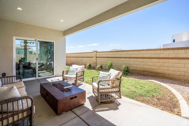 581 W Cypress Umber Dr Unit 34, St George, UT 84790 - view of patio / terrace featuring an outdoor living space with a fire pit and a fenced backyard