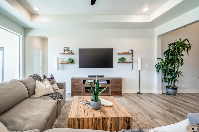 581 W Cypress Umber Dr Unit 34, St George, UT 84790 - living room with a tray ceiling, wood finished floors, baseboards, and recessed lighting