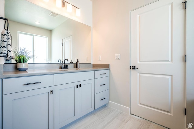 581 W Cypress Umber Dr Unit 34, St George, UT 84790 - bathroom with vanity and baseboards