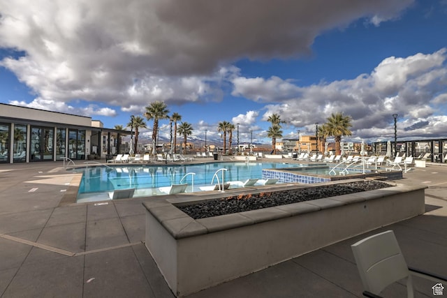 581 W Cypress Umber Dr Unit 34, St George, UT 84790 - community pool with a patio