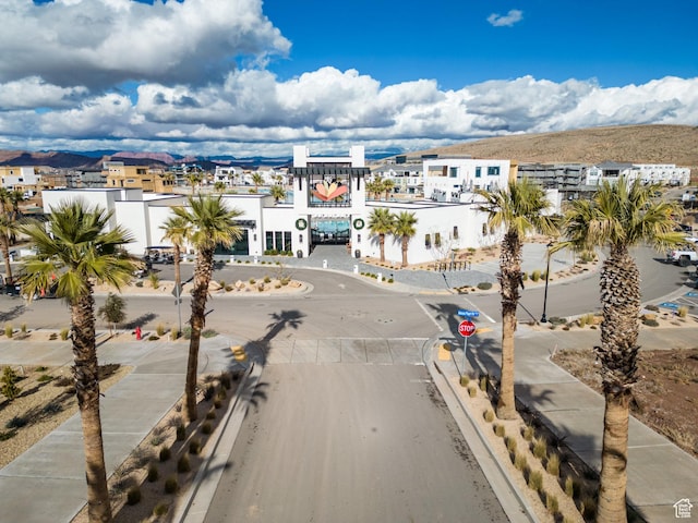 581 W Cypress Umber Dr Unit 34, St George, UT 84790 - view of street featuring sidewalks, traffic signs, and curbs