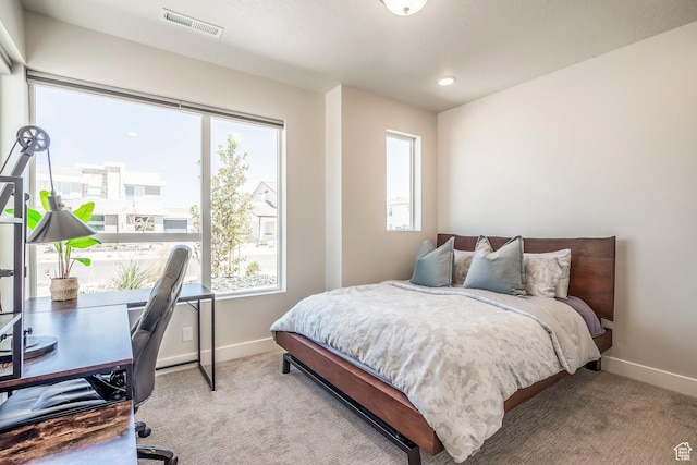 581 W Cypress Umber Dr Unit 34, St George, UT 84790 - bedroom featuring baseboards, carpet floors, and an office area