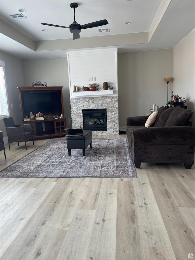 2226 S 2925 W, Cedar City, UT 84720 - living room with ceiling fan, light wood finished floors, a raised ceiling, and visible vents