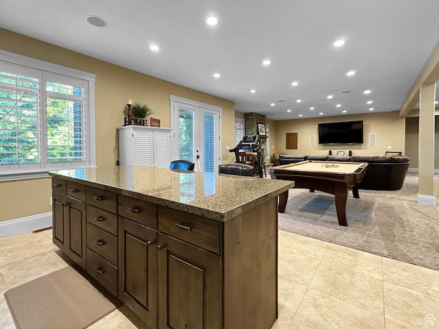 1542 S Valley View Dr, Perry, UT 84302 - kitchen with recessed lighting, a center island, light tile patterned flooring, and french doors