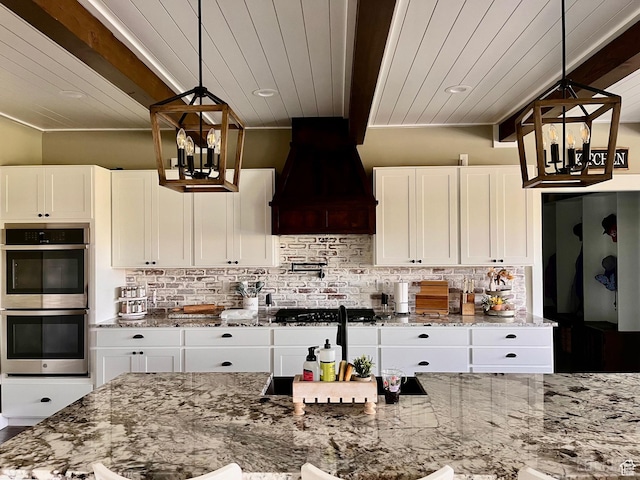 1579 N 2200 E, Preston, ID 83263 - kitchen featuring premium range hood, wooden ceiling, an inviting chandelier, and double oven