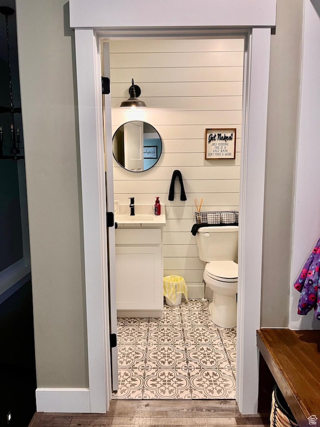 1579 N 2200 E, Preston, ID 83263 - bathroom featuring toilet, wood finished floors, and vanity