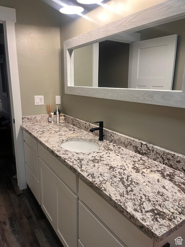 1579 N 2200 E, Preston, ID 83263 - bathroom with vanity and wood finished floors