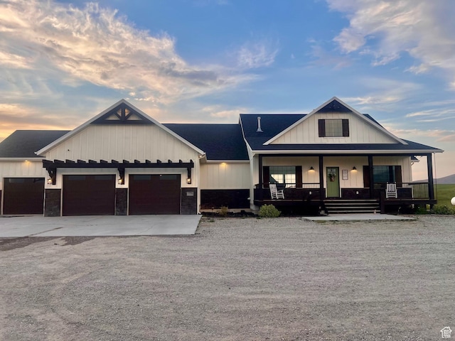 1579 N 2200 E, Preston, ID 83263 - modern inspired farmhouse with board and batten siding, covered porch, a garage, and concrete driveway