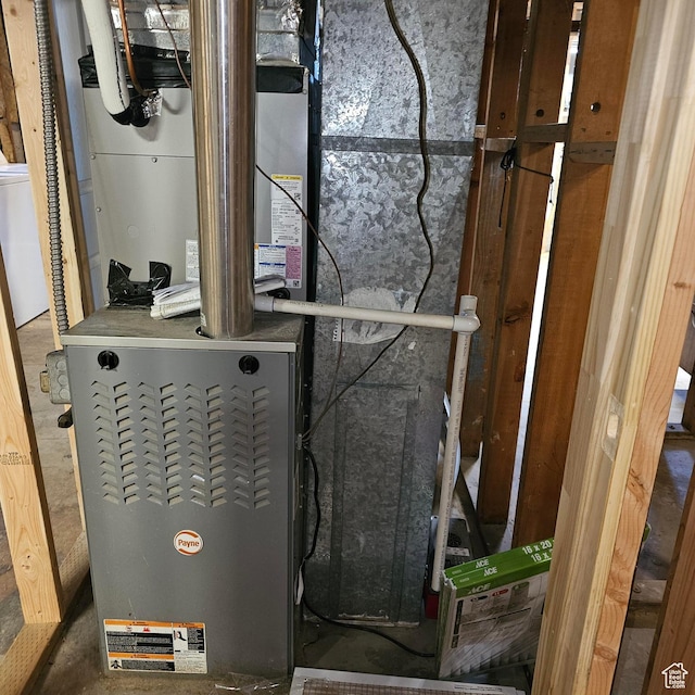 utilities featuring washer / dryer and heating unit