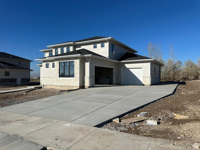 16 W 650 N Unit 1, Salem, UT 84653 - view of front of house with a garage and concrete driveway