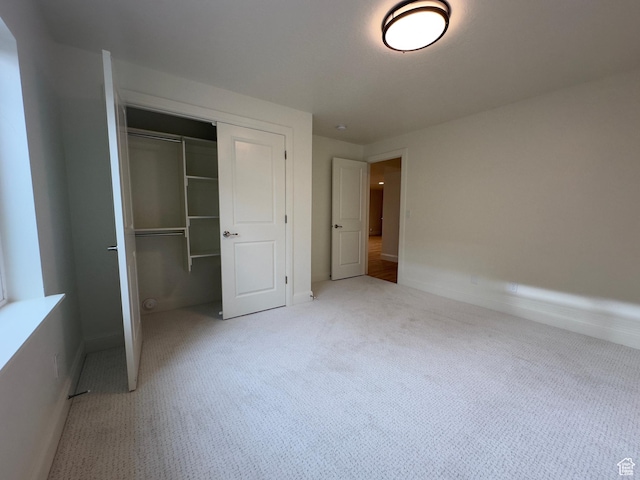 16 W 650 N Unit 1, Salem, UT 84653 - unfurnished bedroom featuring a closet, carpet, and baseboards