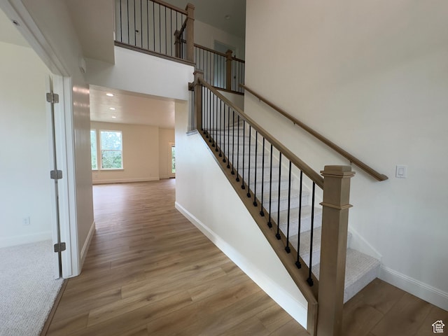 16 W 650 N Unit 1, Salem, UT 84653 - stairs featuring baseboards, wood finished floors, and recessed lighting