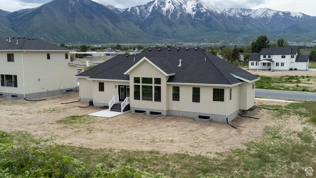 52 W 650 N Unit 3, Salem, UT 84653 - rear view of house featuring roof with shingles, a mountain view, and stucco siding