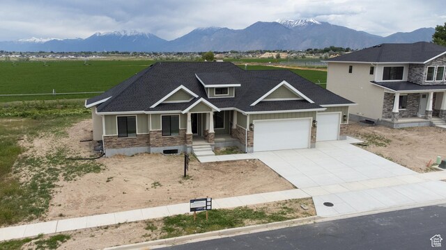 52 W 650 N Unit 3, Salem, UT 84653 - craftsman-style home featuring a porch, a garage, stone siding, concrete driveway, and a mountain view