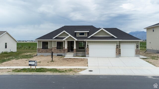 52 W 650 N Unit 3, Salem, UT 84653 - craftsman-style house with stone siding, an attached garage, concrete driveway, and roof with shingles