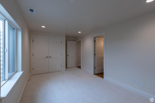 52 W 650 N Unit 3, Salem, UT 84653 - unfurnished bedroom with carpet floors, recessed lighting, baseboards, and a closet